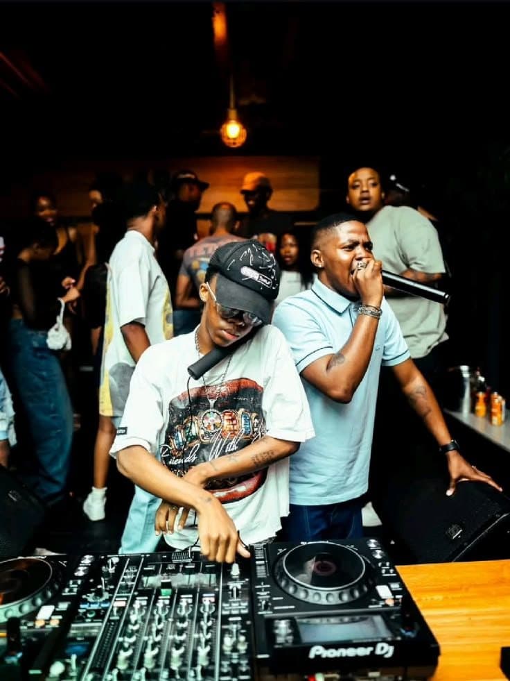 Host on the microphone hyping a crowd
